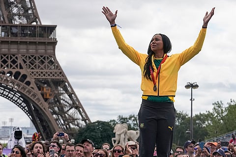 2008 Olympic women's long jump: Chelsea Hammond-Ross of Jamaica waves to the crowd after receiving her bronze medal